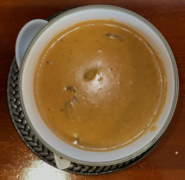 Portion Champignonrahmsoße