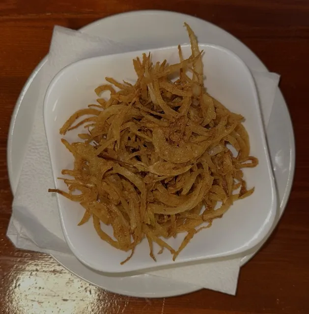 Portion Röstzwiebeln